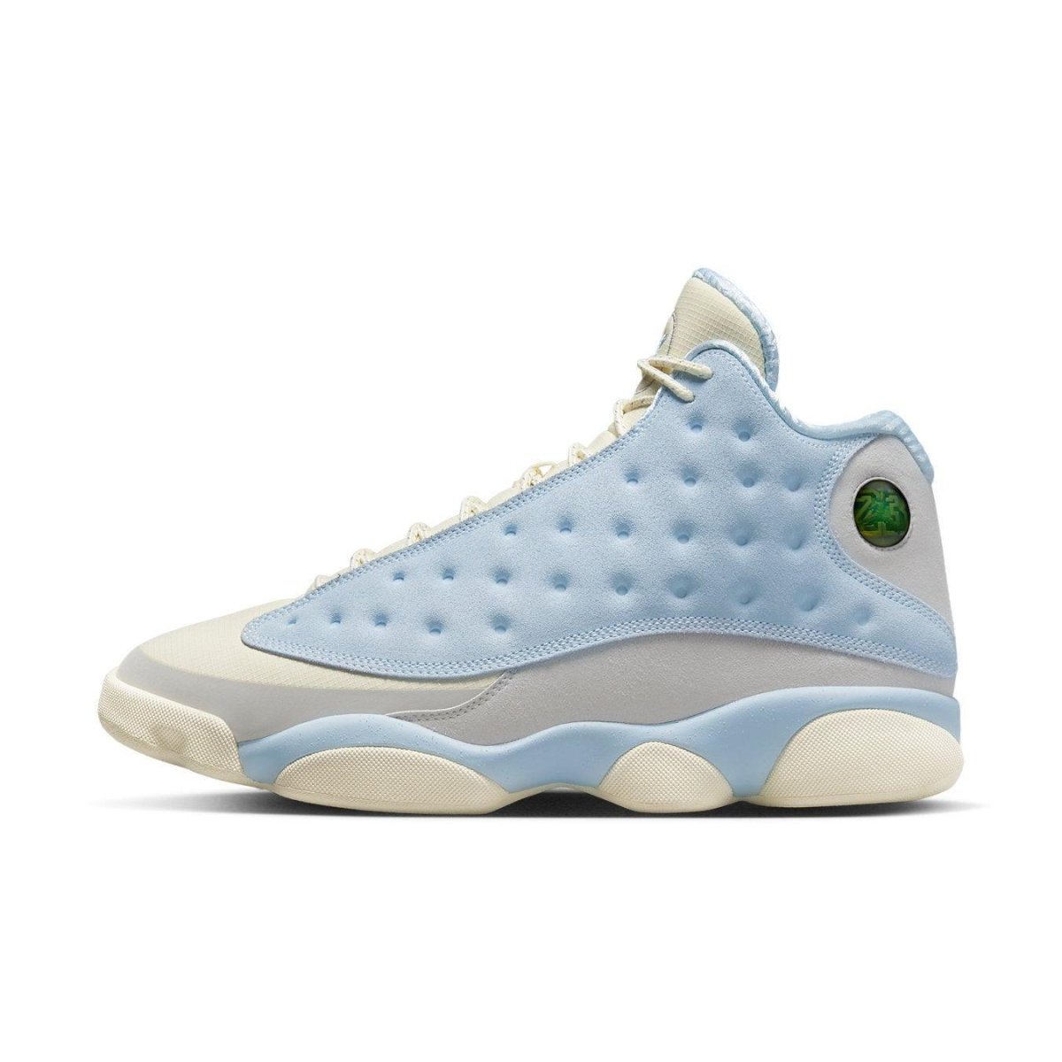 Air Jordan 13 Retro SoleFly in pastel colors, featuring cream ripstop and blue suede, with iconic holographic cat eye.