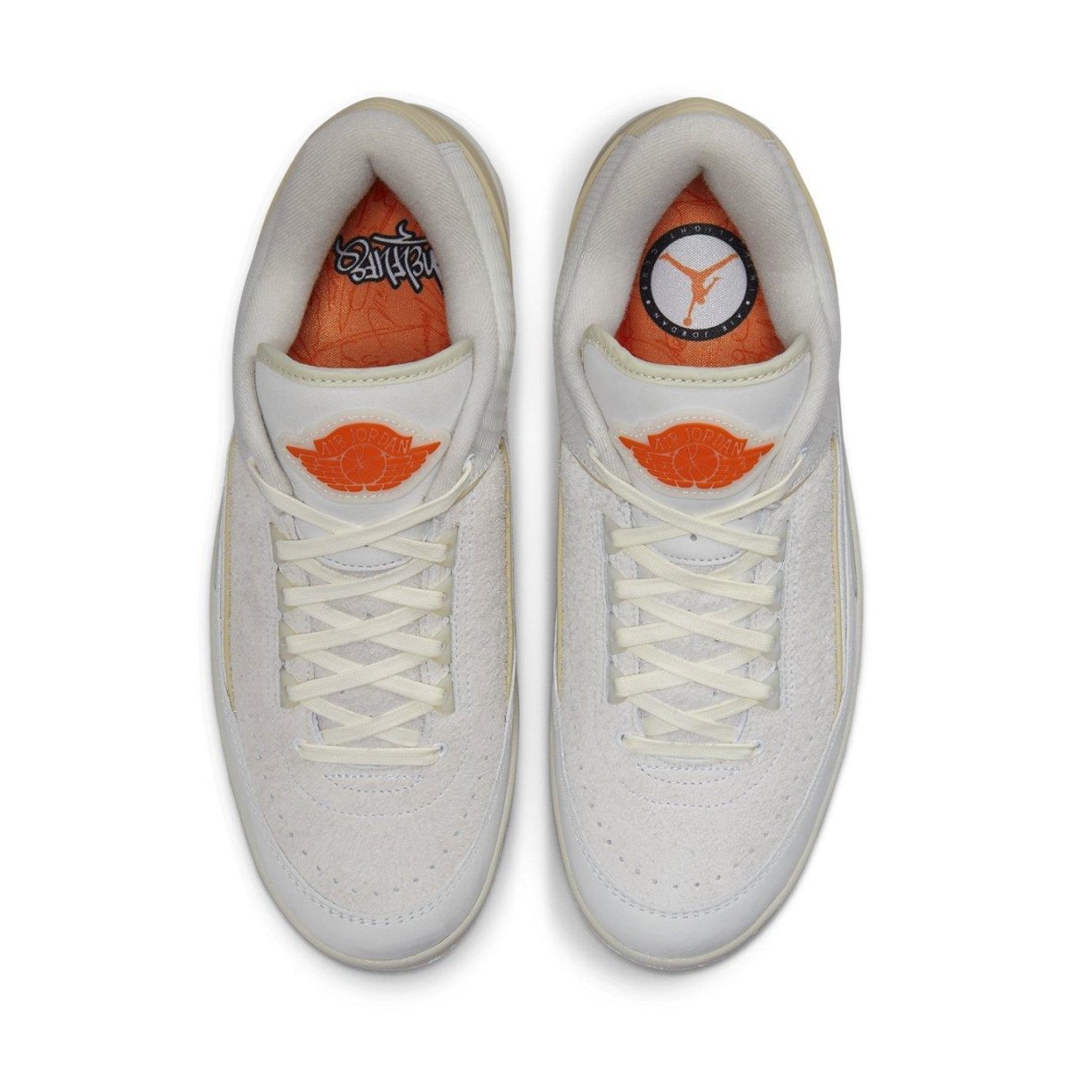 Jordan 2 Retro Low Shelflife sneaker featuring a white upper and orange accents, top view of the stylish design.