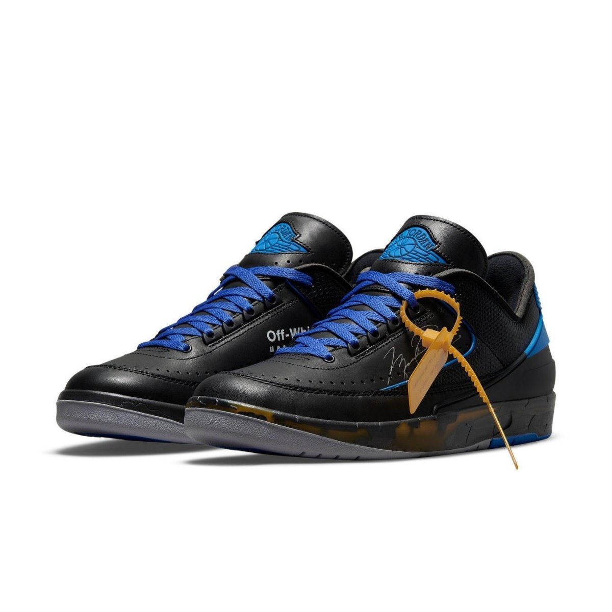 Off-White x Air Jordan 2 Retro Low SP black blue sneakers with textured finish and exposed foam tongue.