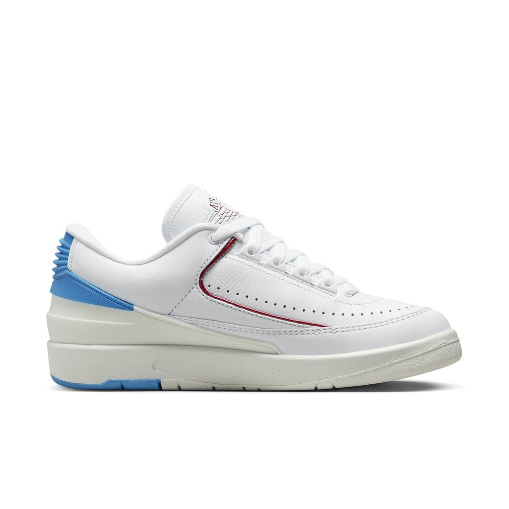 Jordan 2 Retro Low UNC To Chicago (W) in white, red, and dark powder blue with iconic design and college tribute.