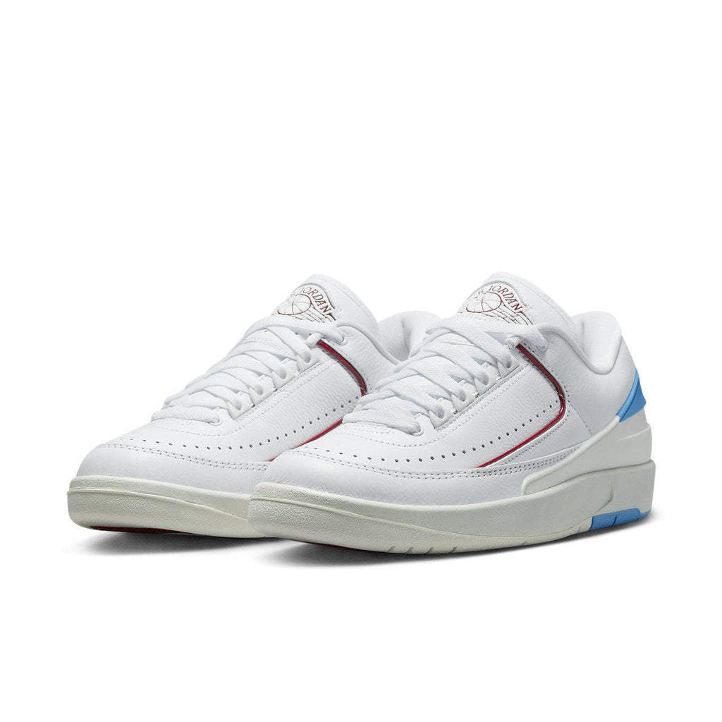 Jordan 2 Retro Low UNC To Chicago (W) in white, red, and powder blue colors, showcasing sleek design and premium leather.