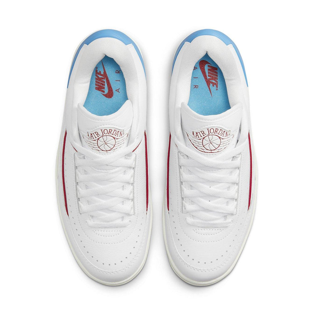 Air Jordan 2 Retro Low UNC To Chicago (W) in white, red, and powder blue from above showing laces and logo.