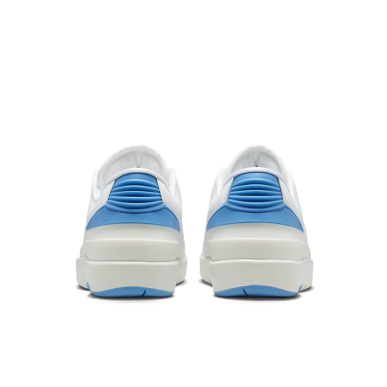 Retro Jordan 2 Low UNC to Chicago (W) shoes featuring white leather and dark powder blue accents on the heel.