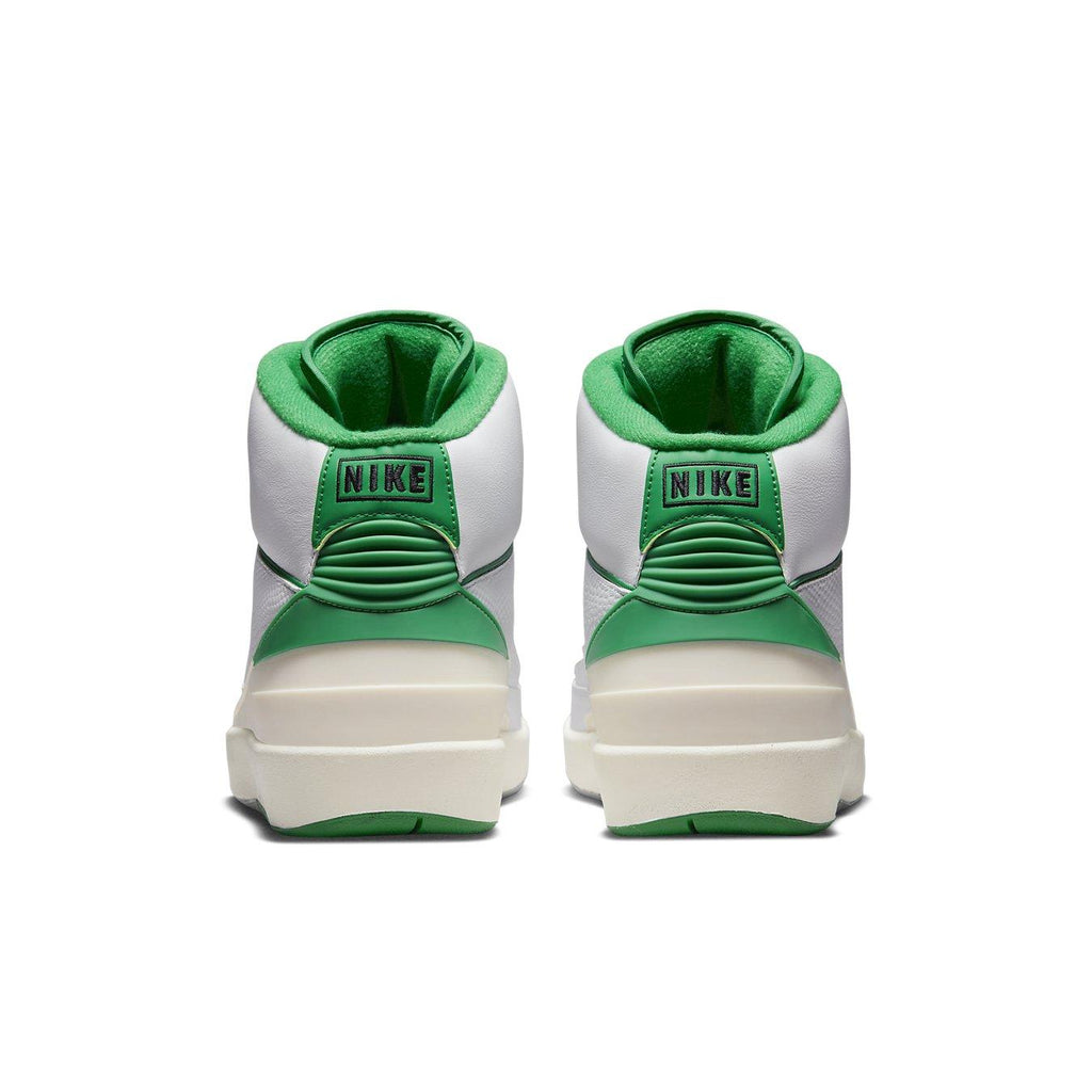 Back view of Nike Jordan 2 Retro Lucky Green sneakers showcasing green and white design.