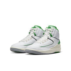 Air Jordan 2 Retro Lucky Green sneakers in GS size featuring white leather and Lucky Green accents.