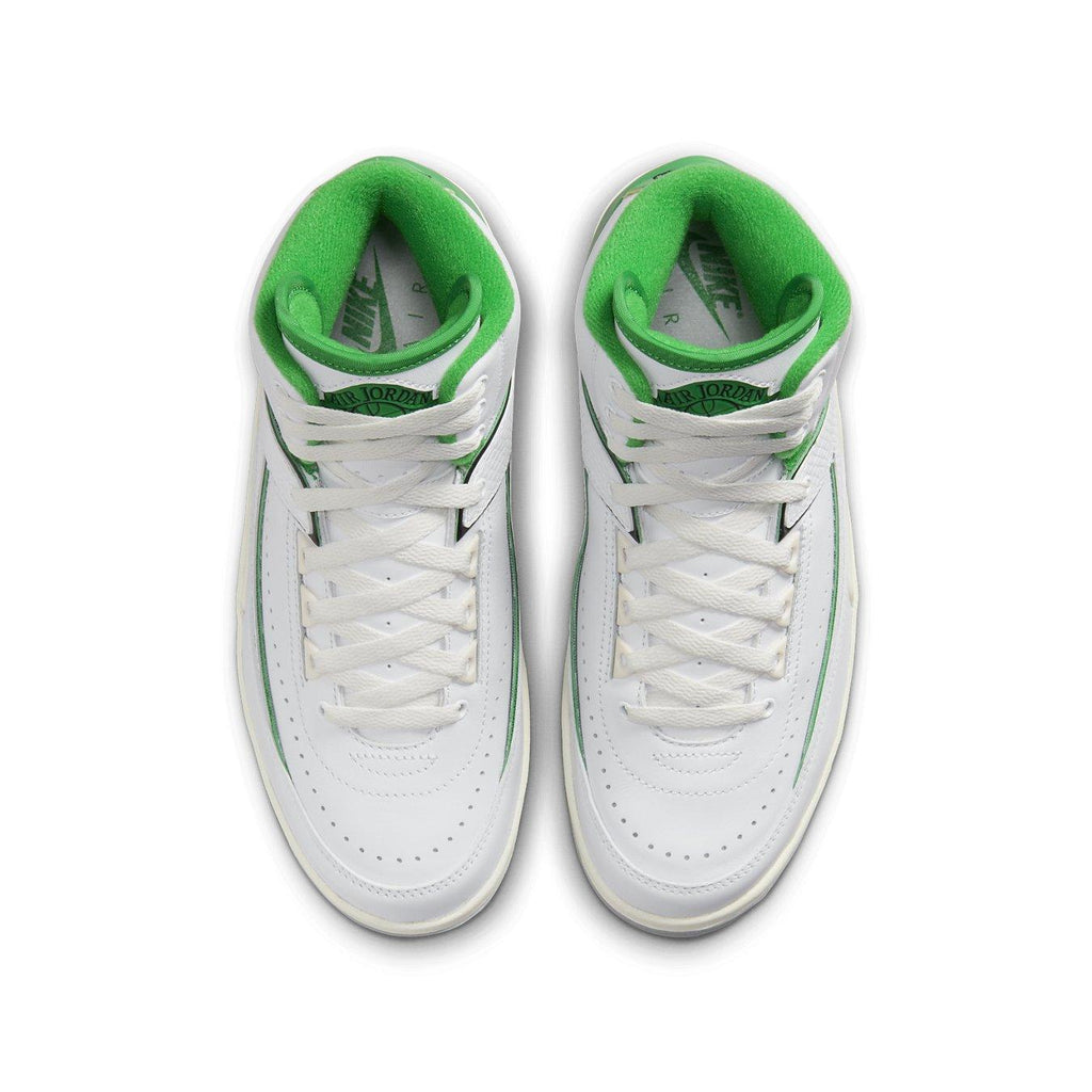 Jordan 2 Retro Lucky Green (GS) sneakers featuring white leather and Lucky Green accents, inspired by the Boston Celtics.