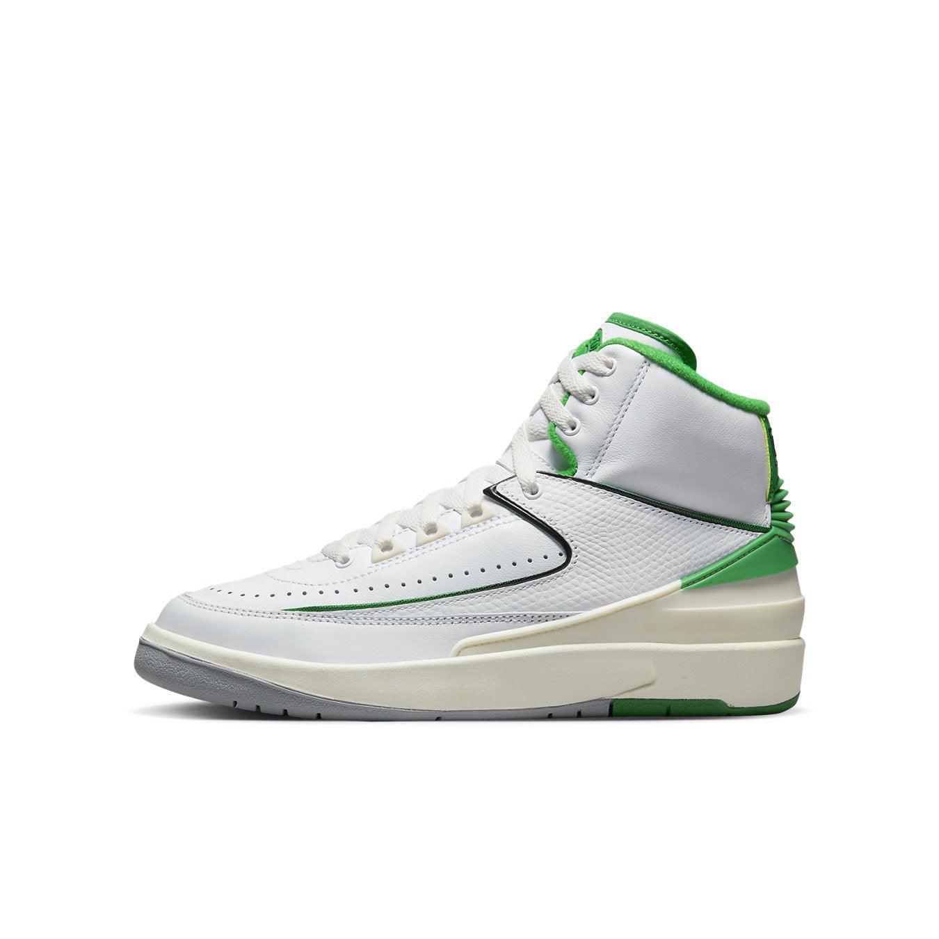 Air Jordan 2 Retro Lucky Green GS sneakers with white leather and Lucky Green accents side view.