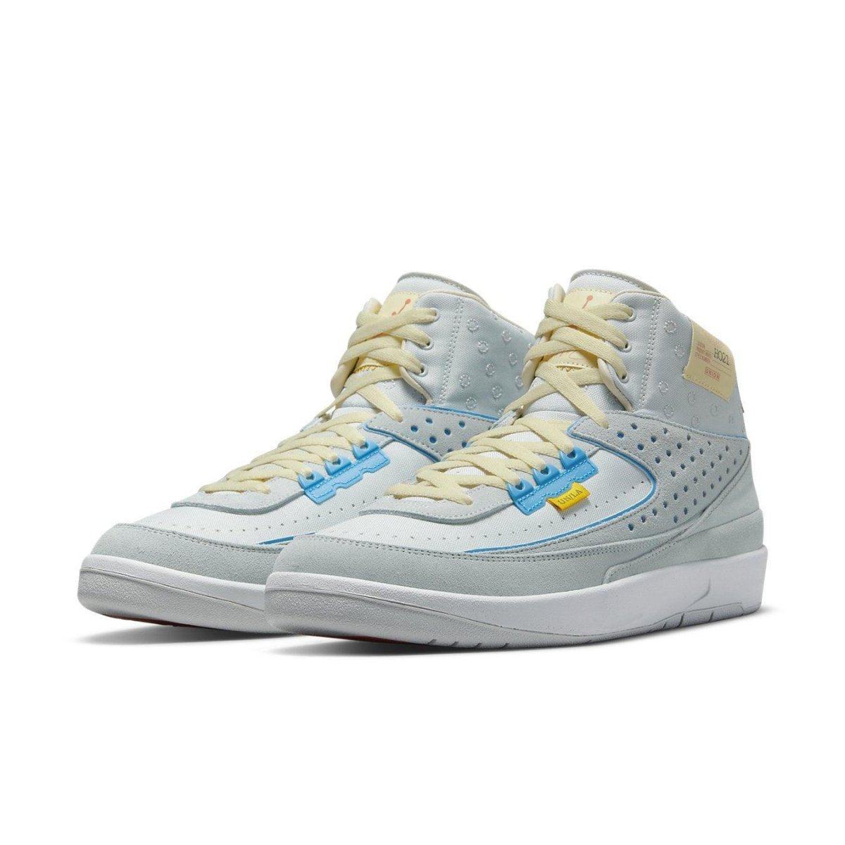 Air Jordan 2 Retro SP Union Grey Fog sneakers, featuring light blue suede upper and bright blue details.