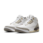 Jordan 3 Retro A Ma Maniére women's sneakers in white leather and gray suede, featuring premium detailing and unique branding.