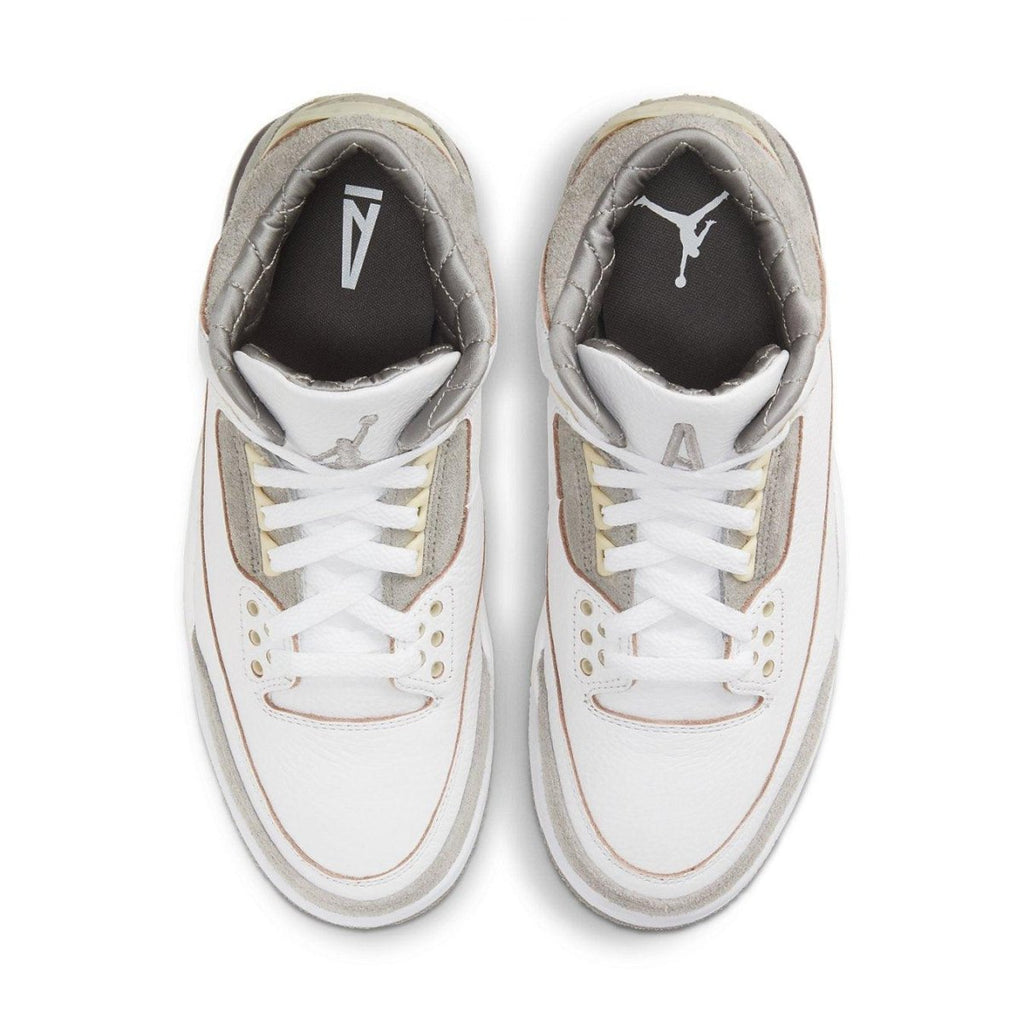 Top view of Air Jordan 3 Retro A Ma Maniére sneaker with white leather and gray suede accents.