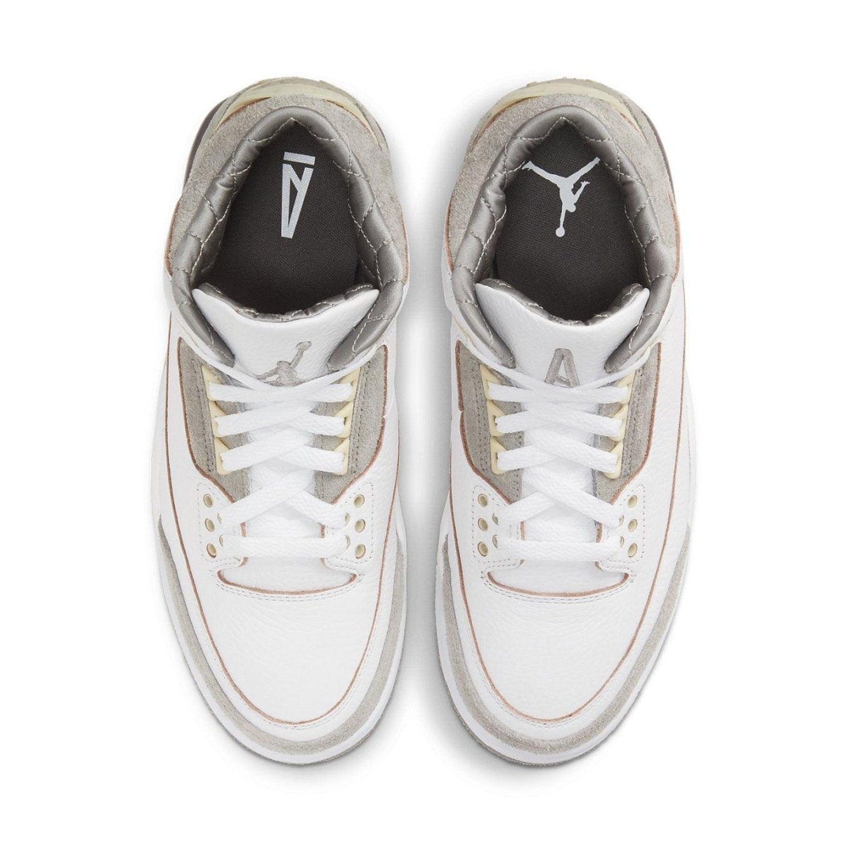 Top view of Air Jordan 3 Retro A Ma Maniére sneaker with white leather and gray suede accents.