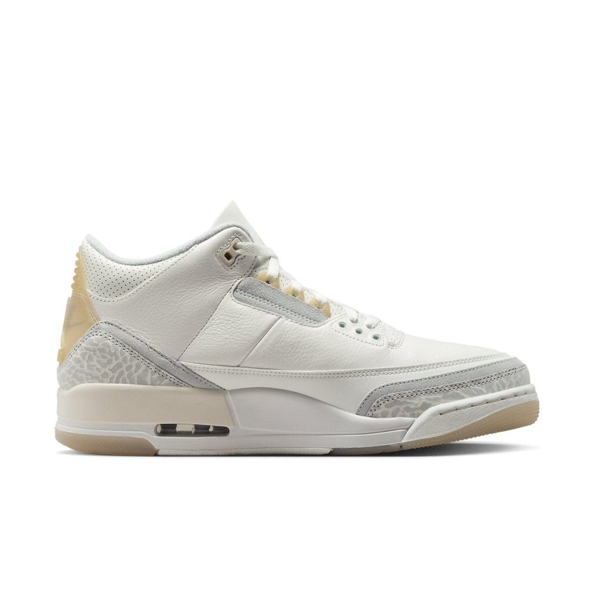 Air Jordan 3 Retro Craft Ivory sneaker showcasing a refined design in ivory and grey tones with suede and leather details.