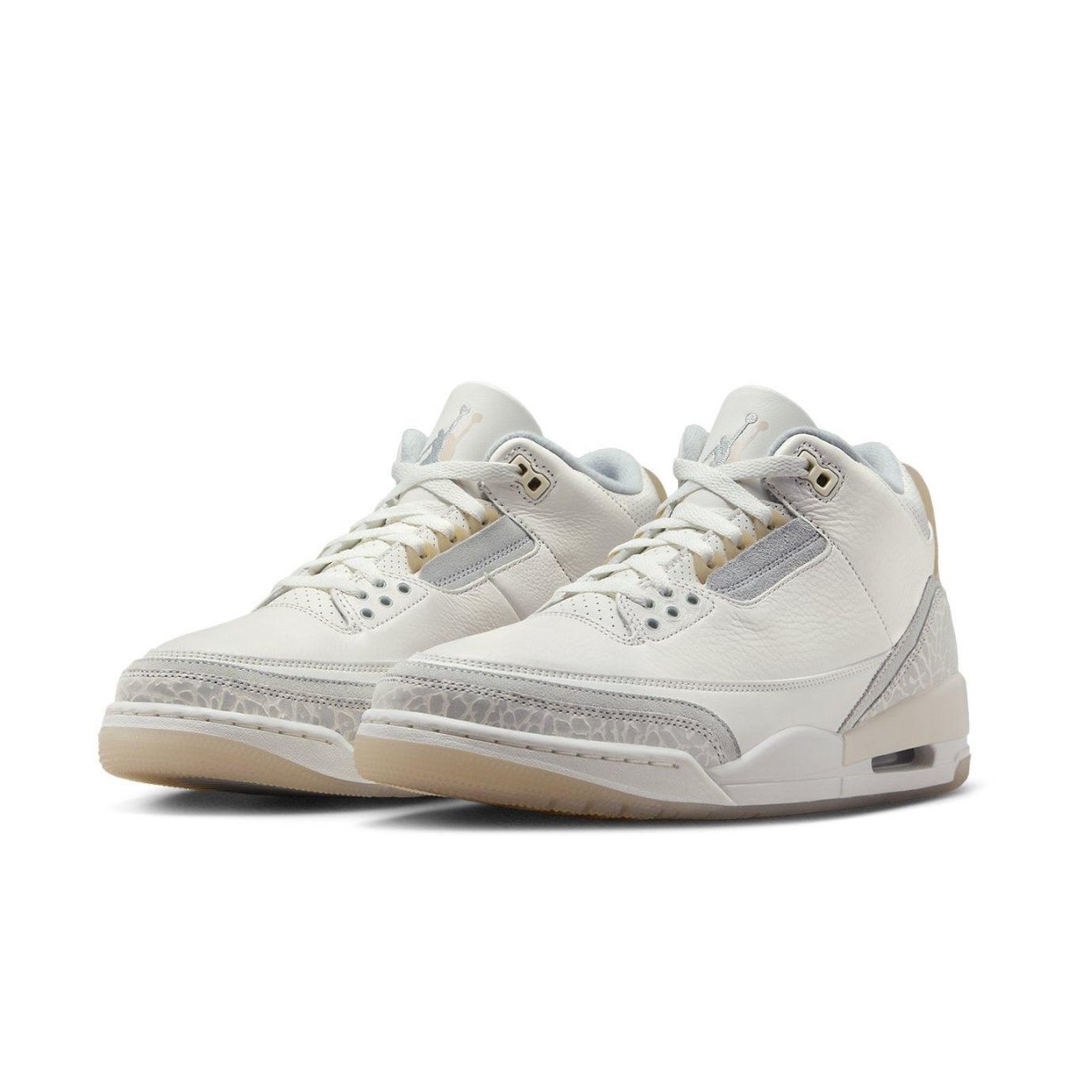 Jordan 3 Retro Craft Ivory sneakers showcasing an ivory and grey colorway with premium leather upper and suede overlays.
