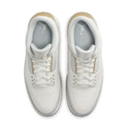 Top view of the Jordan 3 Retro Craft Ivory sneaker with sleek white leather and gold accents.