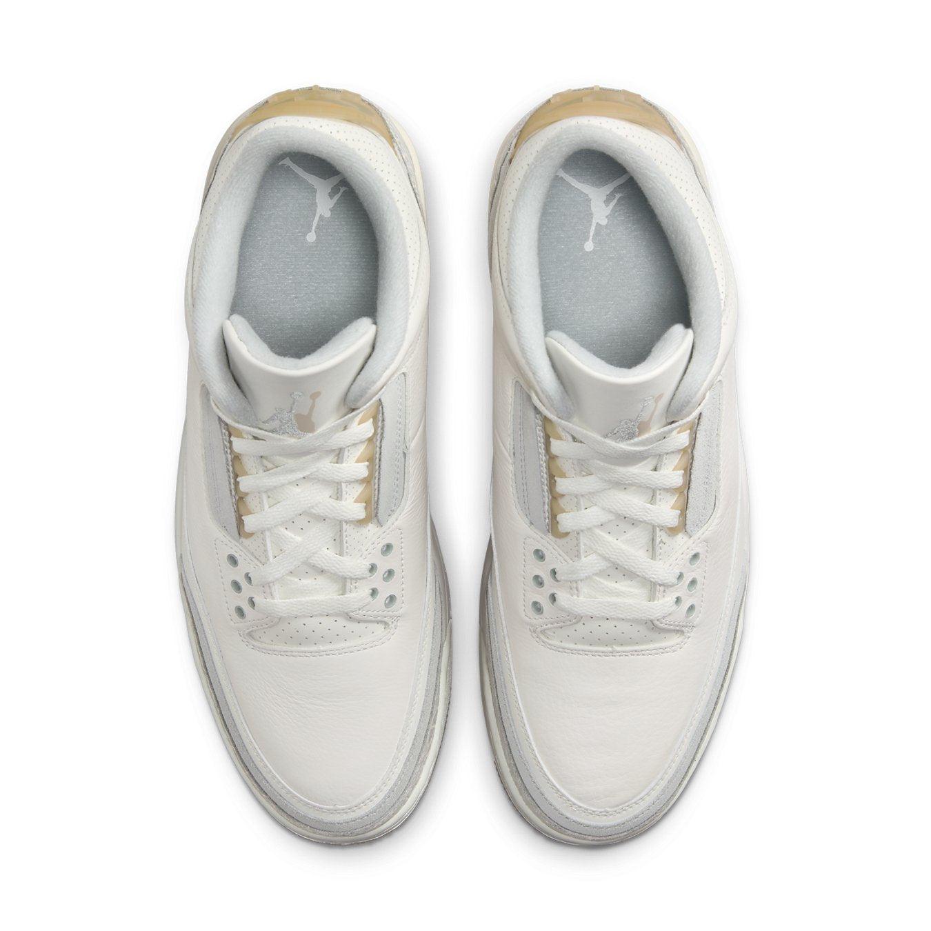 Top view of the Jordan 3 Retro Craft Ivory sneaker with sleek white leather and gold accents.