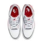 Top view of Air Jordan 3 Retro Fire Red 2022 sneaker featuring white leather, gray elephant print accents, and red details.