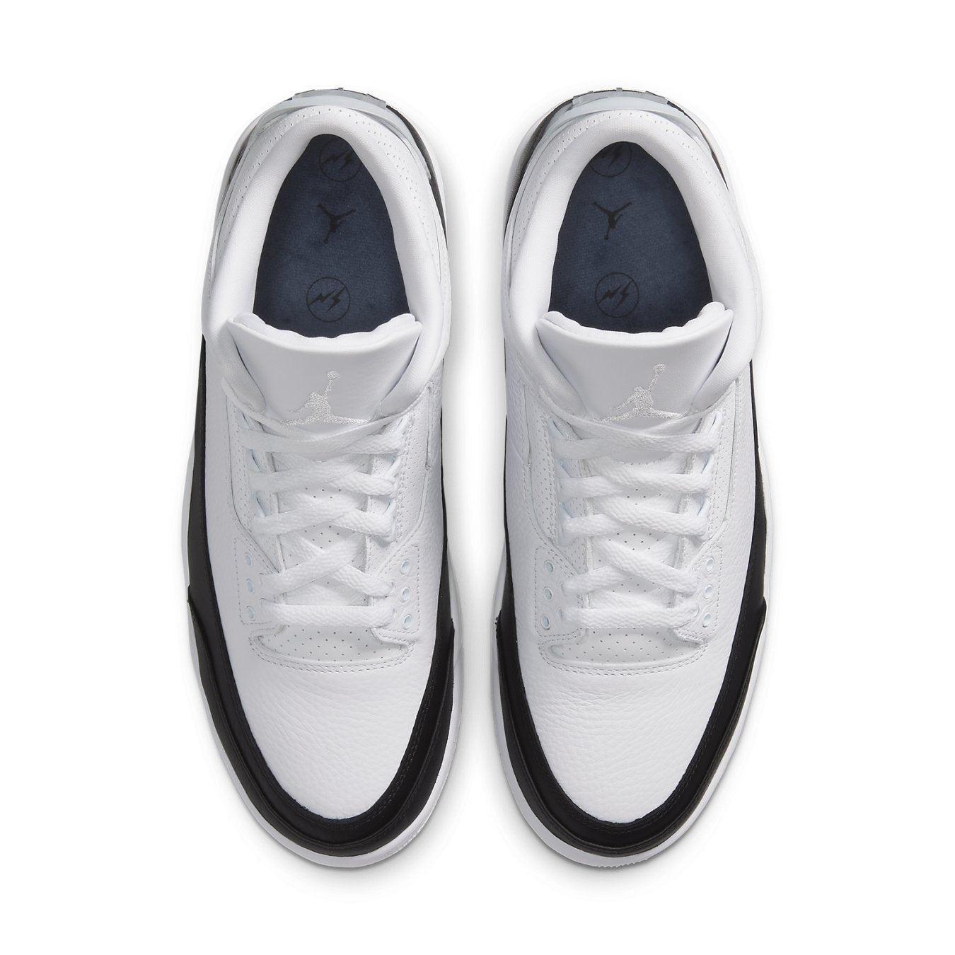 Top view of Jordan 3 Retro Fragment sneakers in white and black colorway, featuring premium leather and classic design.