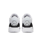 Rear view of Jordan 3 Retro Fragment sneakers in black and white with AIR logo detail.