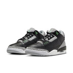Jordan 3 Retro Green Glow sneakers featuring black leather upper and grey mesh with subtle green accents.