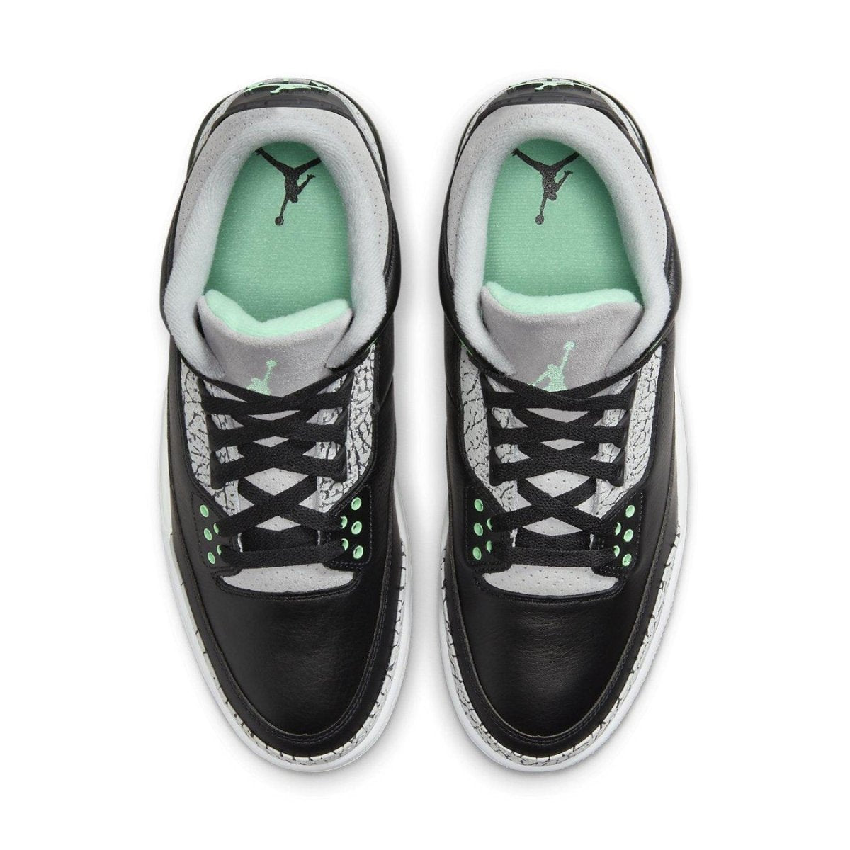 Jordan 3 Retro Green Glow shoes featuring black leather upper, grey mesh, and green accents, top view.