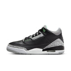 Jordan 3 Retro Green Glow sneaker featuring black leather and gray mesh design with subtle green accents.