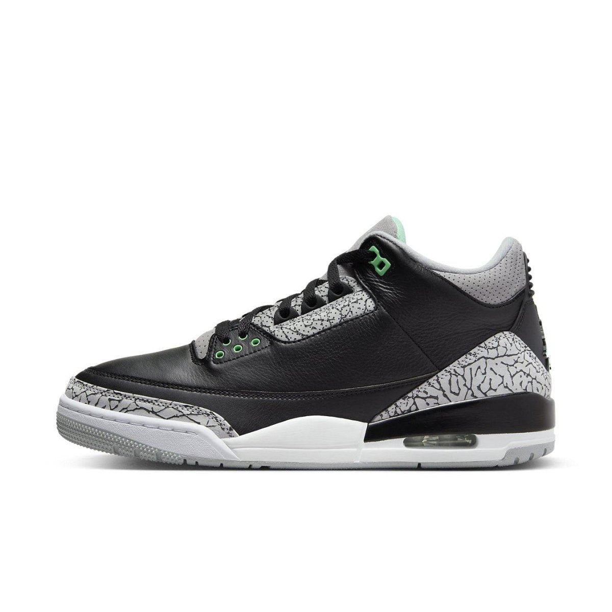 Jordan 3 Retro Green Glow sneaker featuring black leather and gray mesh design with subtle green accents.
