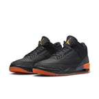 Jordan 3 Retro J Balvin Rio featuring black leather upper and elephant print overlays, accented in Solar Flare and Total Crimson Abyss.