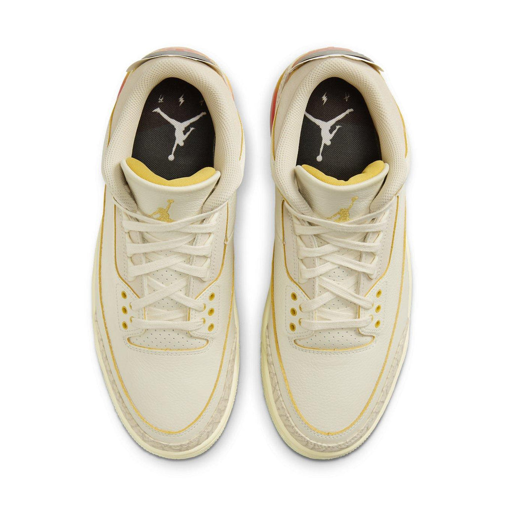 Top view of Jordan 3 Retro SP J Balvin Medellín Sunset in ivory leather with yellow accents.