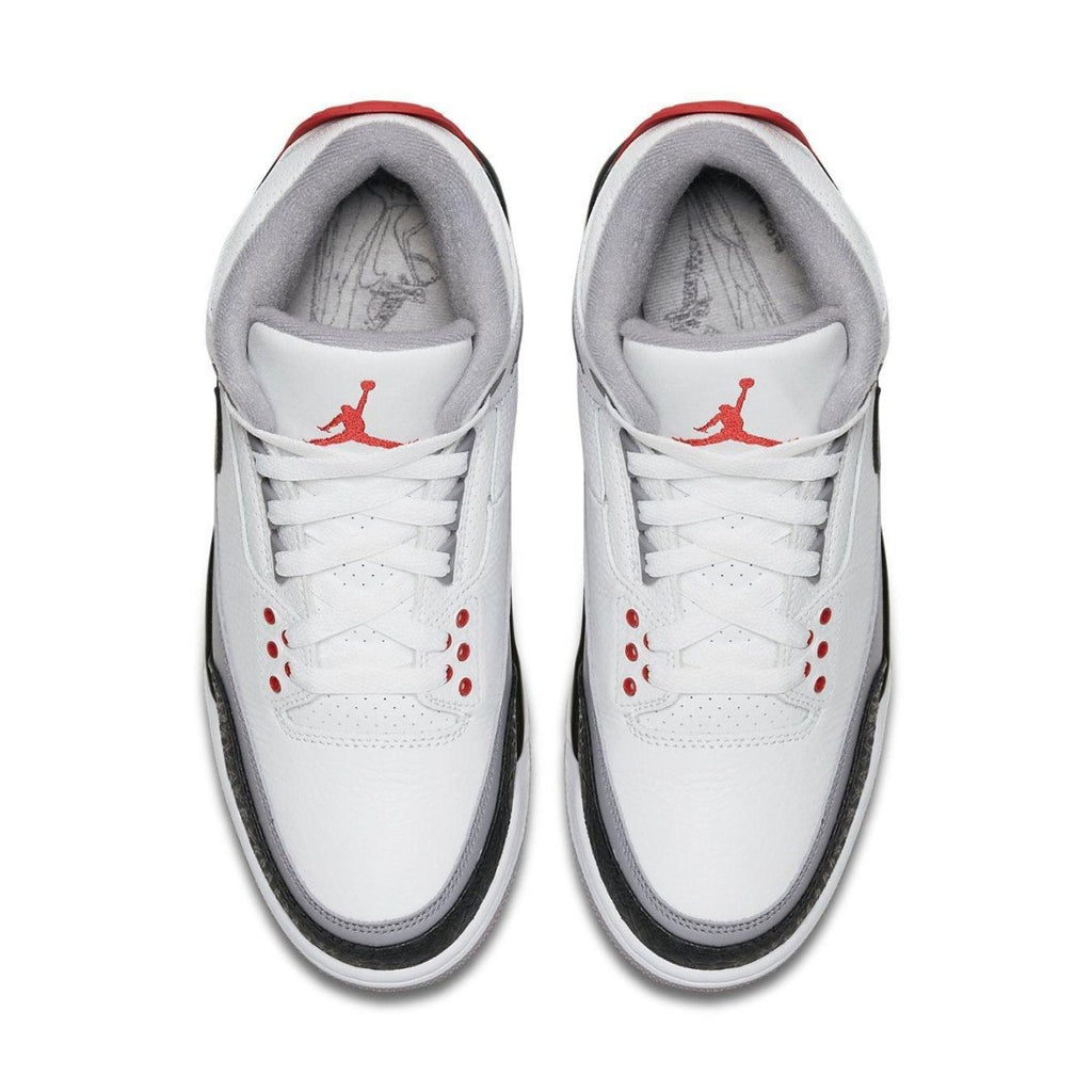 Jordan 3 Retro Tinker Hatfield sneakers with white and black colorway and red accents, featuring classic design elements.