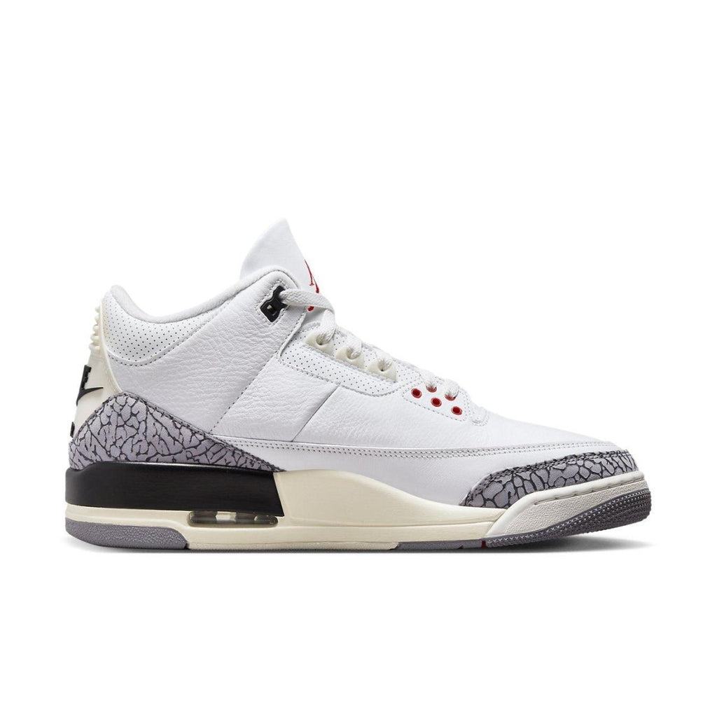 Air Jordan 3 Retro White Cement Reimagined sneaker featuring white leather and elephant print accents.