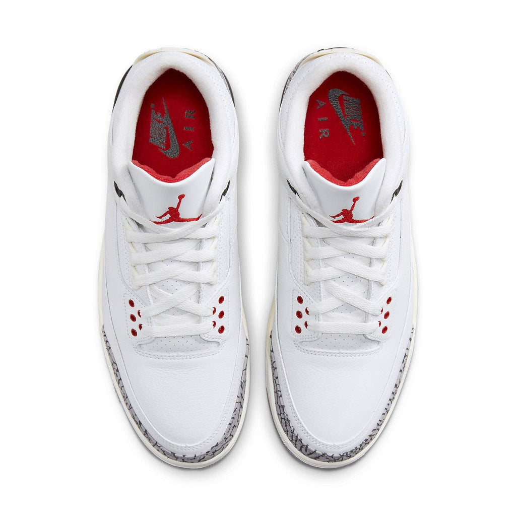 Air Jordan 3 Retro White Cement Reimagined sneakers, featuring white leather upper and iconic elephant print details.