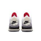 Back view of Air Jordan 3 Retro White Cement Reimagined featuring leather upper and elephant print accents.