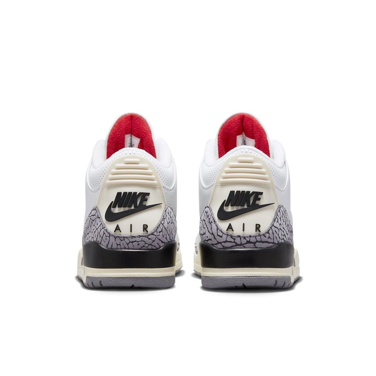 Back view of Air Jordan 3 Retro White Cement Reimagined featuring leather upper and elephant print accents.