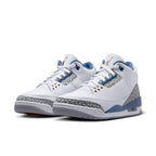 Air Jordan 3 Retro Wizards in white leather with elephant print overlays and blue accents.