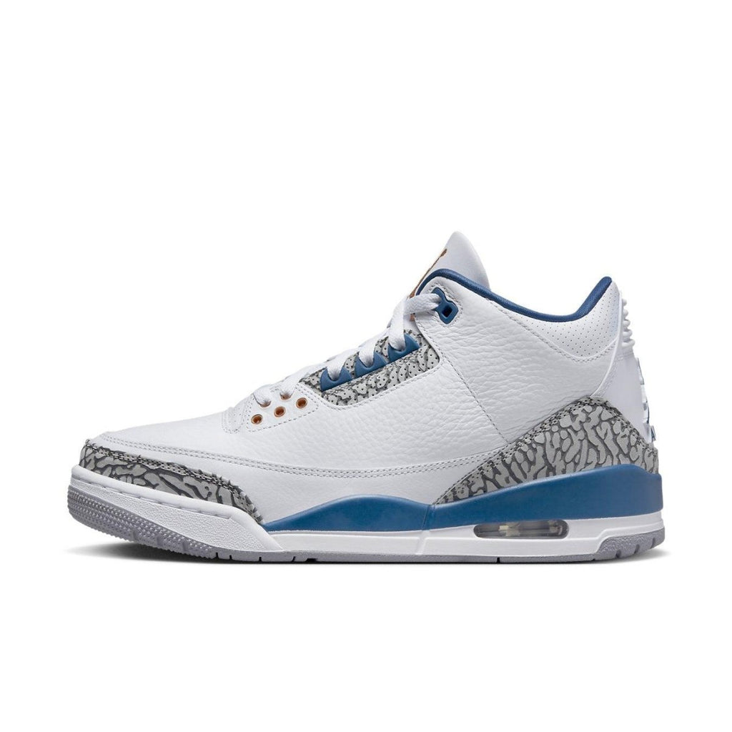 Air Jordan 3 Retro Wizards sneaker featuring white leather upper and elephant print details.