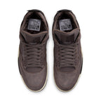 Jordan 4 Retro A Ma Maniére Violet Ore aerial view showcasing soft suede and signature branding details.