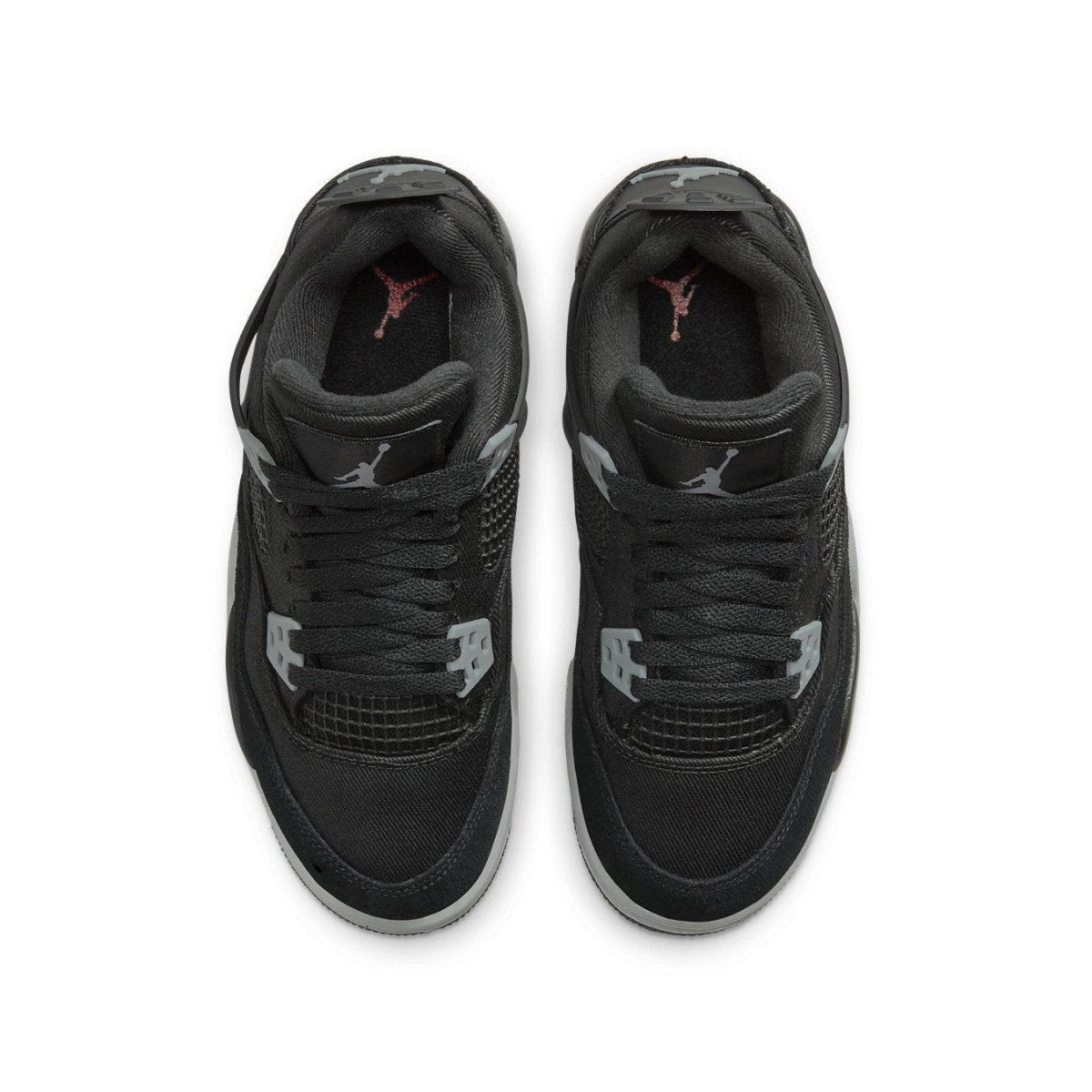 Top view of Air Jordan 4 Retro Black Canvas GS sneakers featuring black canvas and suede detailing.