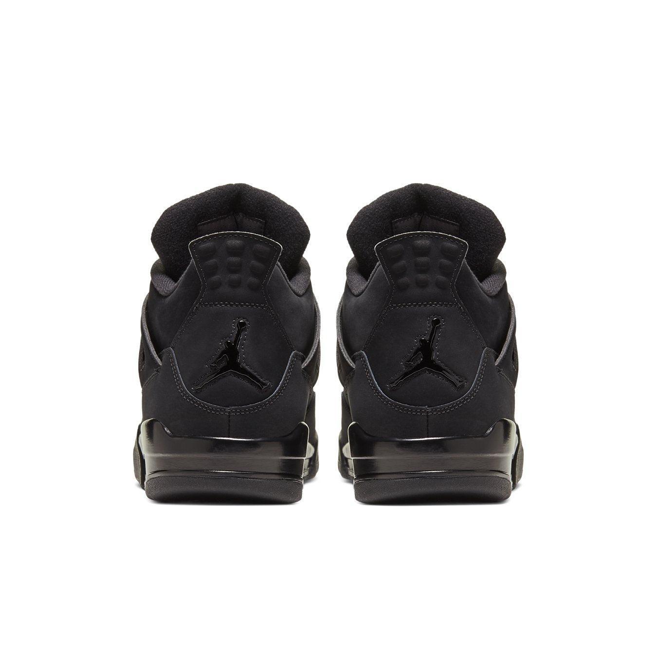 Jordan 4 Retro Black Cat (2020) back view, featuring all-black design with premium suede and nubuck materials.