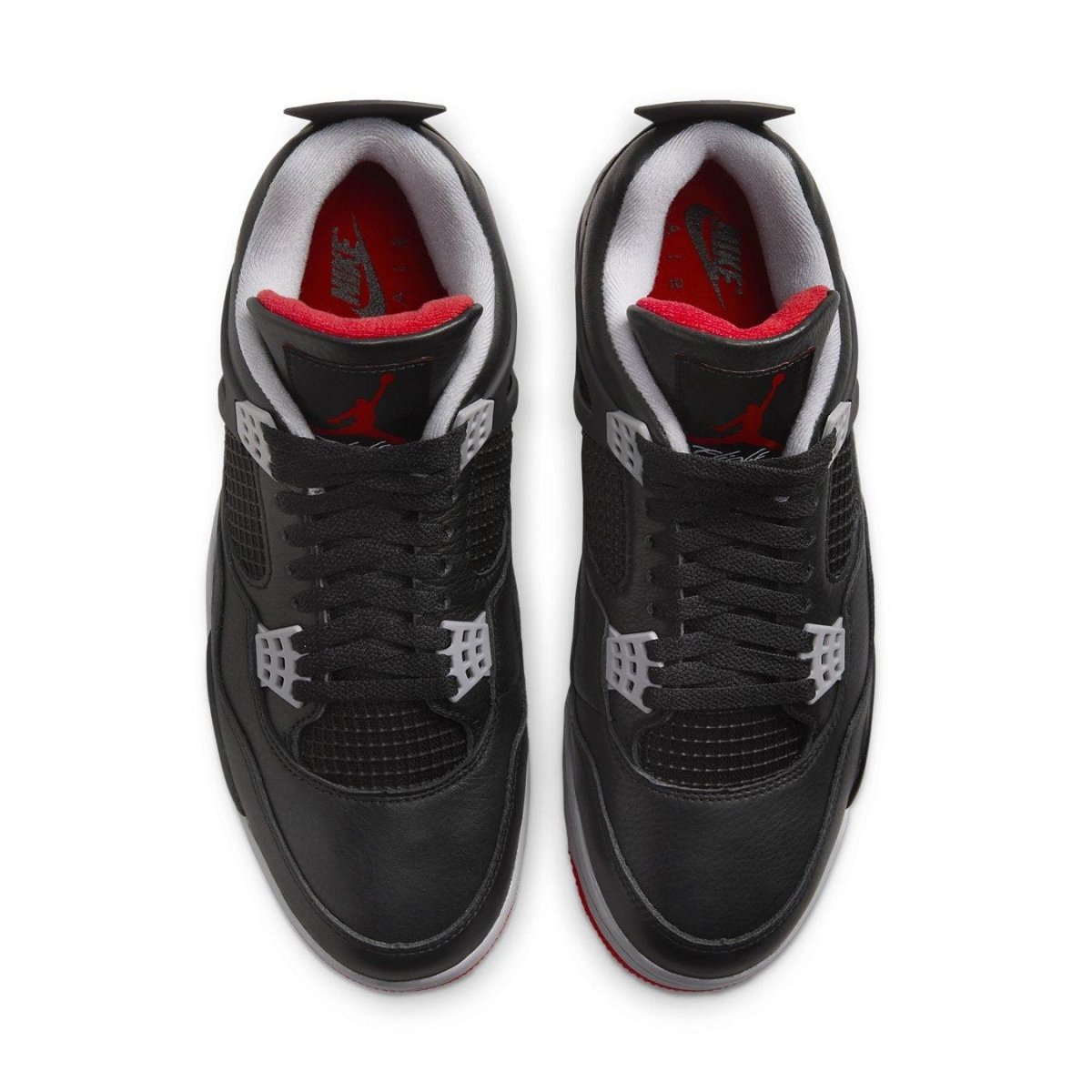 Air Jordan 4 Retro Bred Reimagined sneakers, featuring sleek black leather, red accents, and iconic design elements.