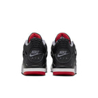 Back view of Nike Air Jordan 4 Retro Bred Reimagined GS showcasing black leather and red accents.