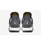 Rear view of Air Jordan 4 Retro 'Cool Grey' sneakers showcasing grey nubuck and iconic Jumpman logo.