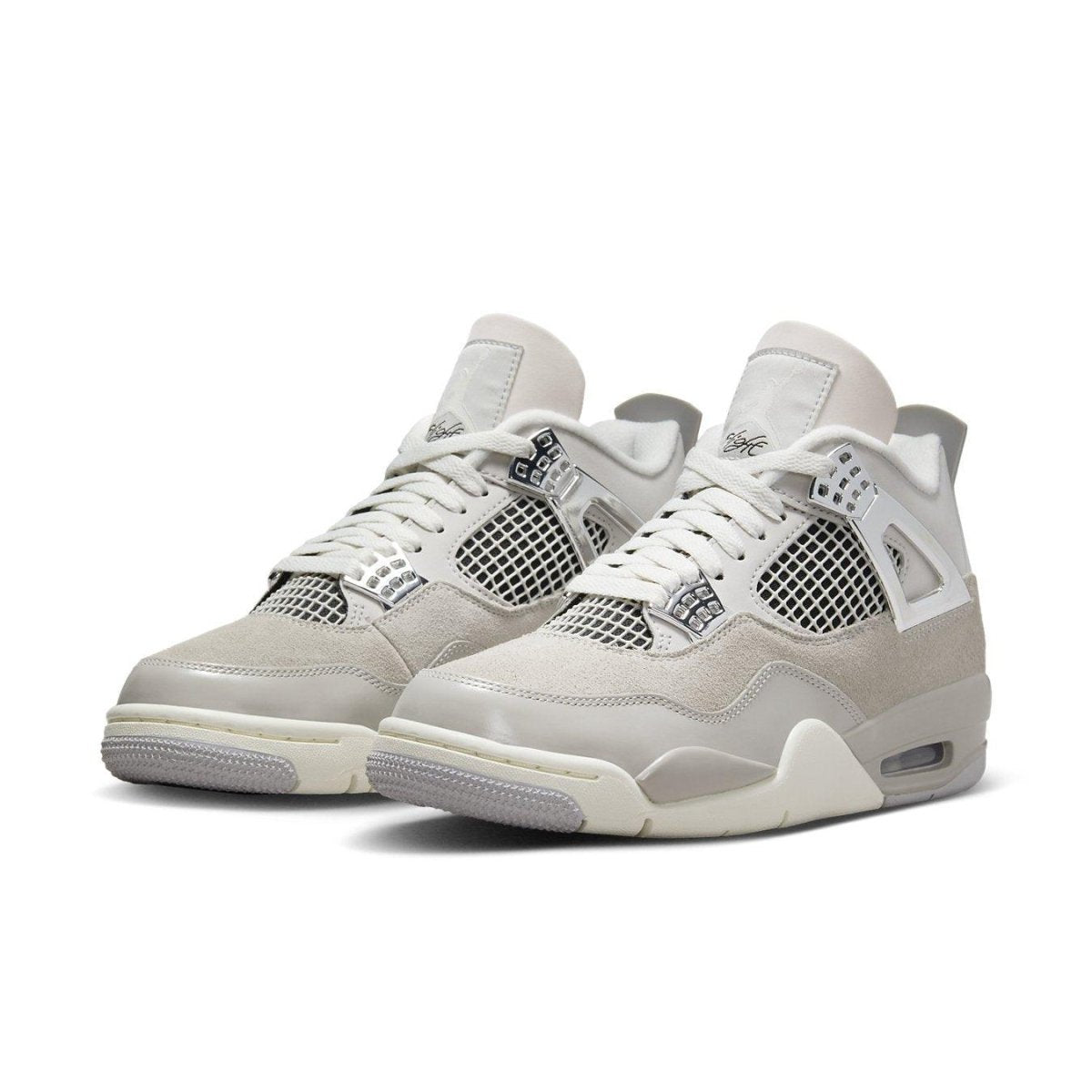 Jordan 4 Retro Frozen Moments women's sneakers in grey suede with glossy accents and metallic details.