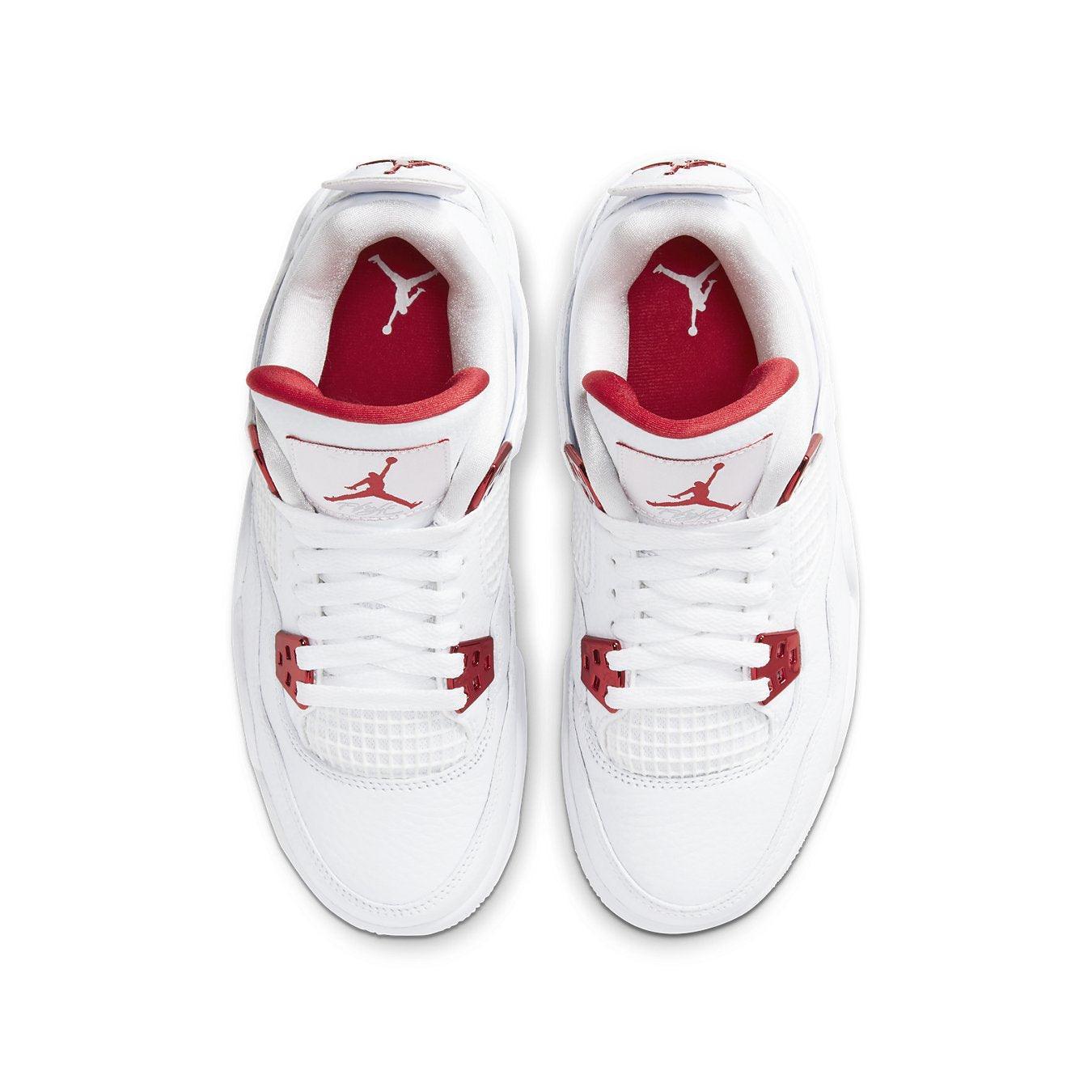 Air Jordan 4 Retro Metallic Red GS shoes, white with red accents, showcasing the iconic silhouette from above.