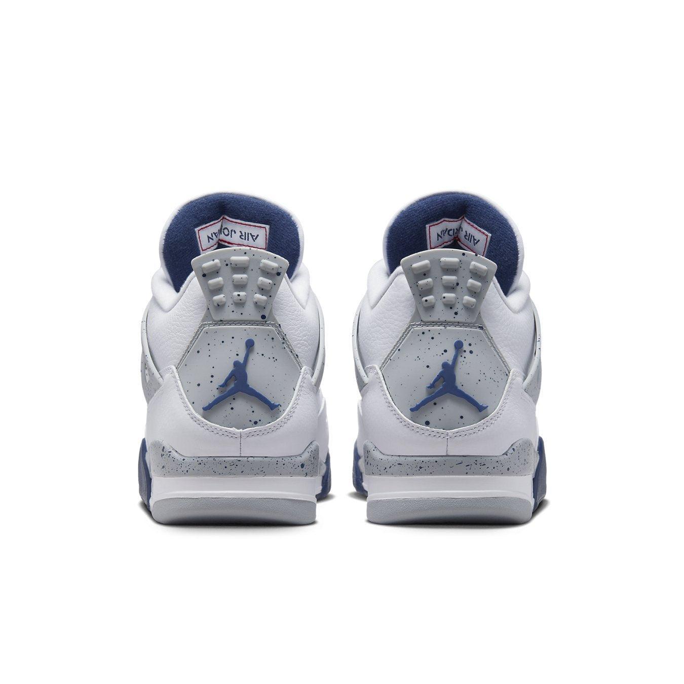 Air Jordan 4 Retro Midnight Navy shoes, featuring a white leather upper, navy accents, and iconic Jumpman logos.