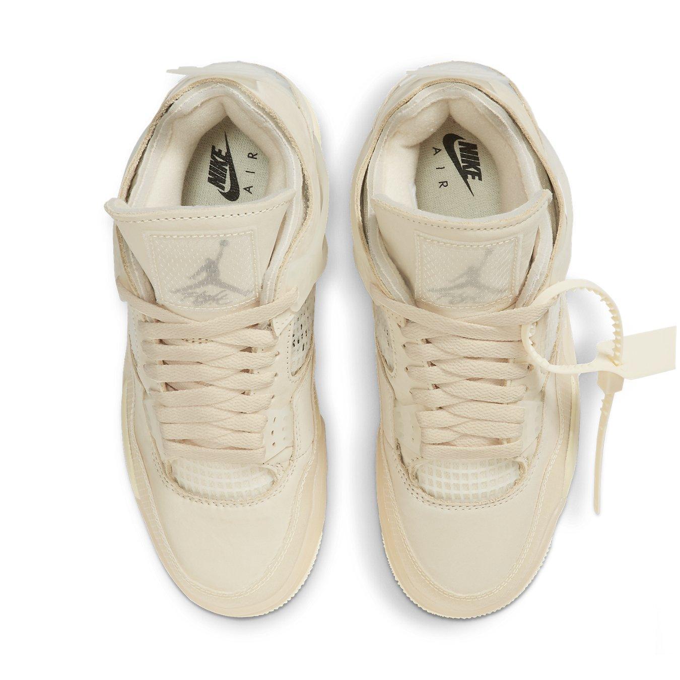 Top view of women's Jordan 4 Retro Off-White Sail sneakers featuring off-white leather and translucent detailing.