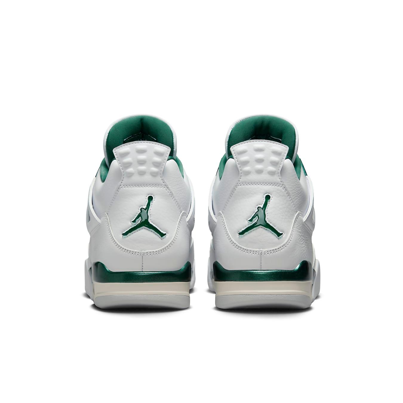 Back view of Jordan 4 Retro Oxidized Green sneaker featuring white leather and contrasting green accents.