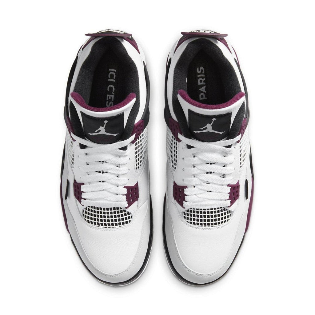 Top view of Jordan 4 Retro PSG sneakers featuring white leather, black accents, and Bordeaux details.