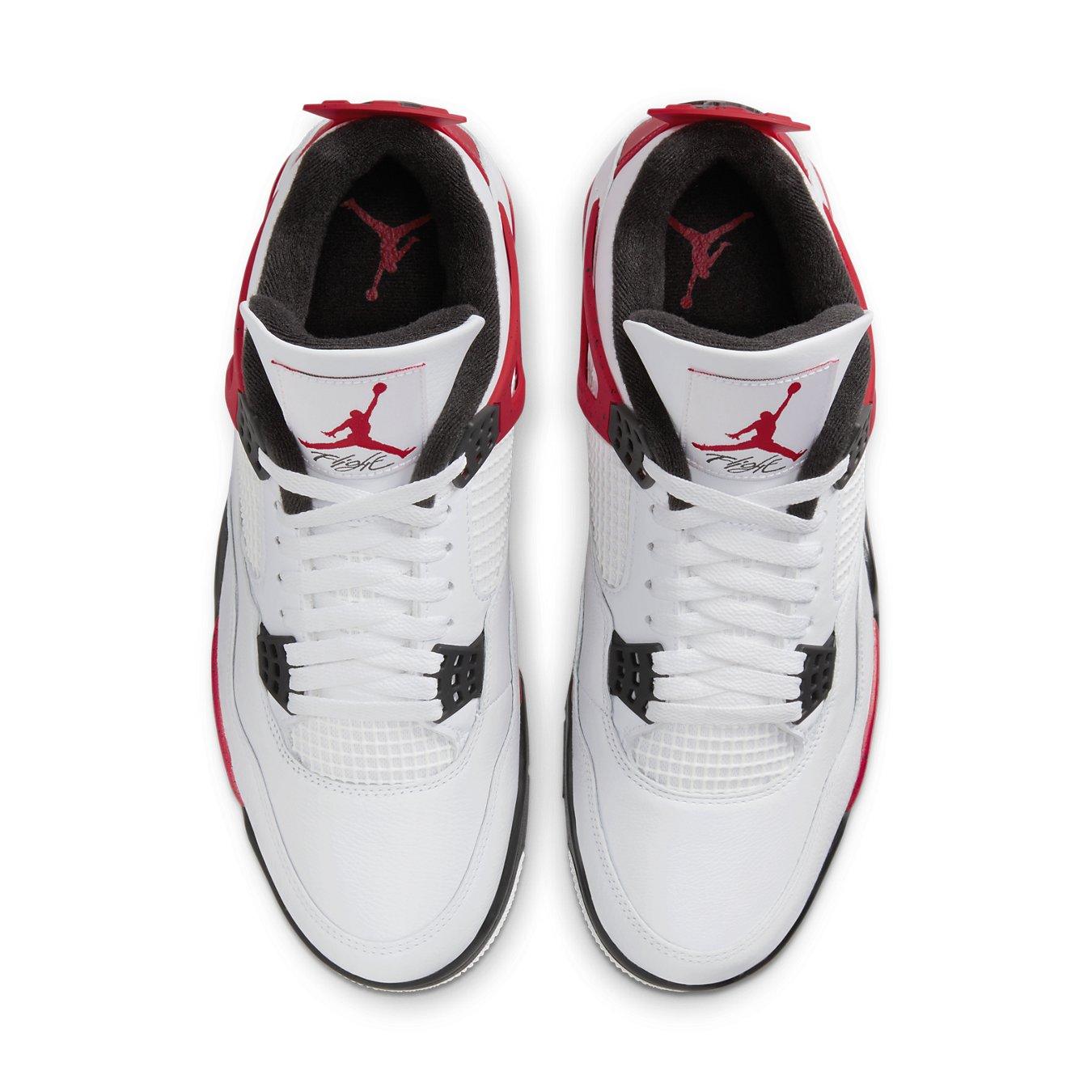 Air Jordan 4 Retro Red Cement sneakers, featuring white leather and Fire Red accents, overhead view.