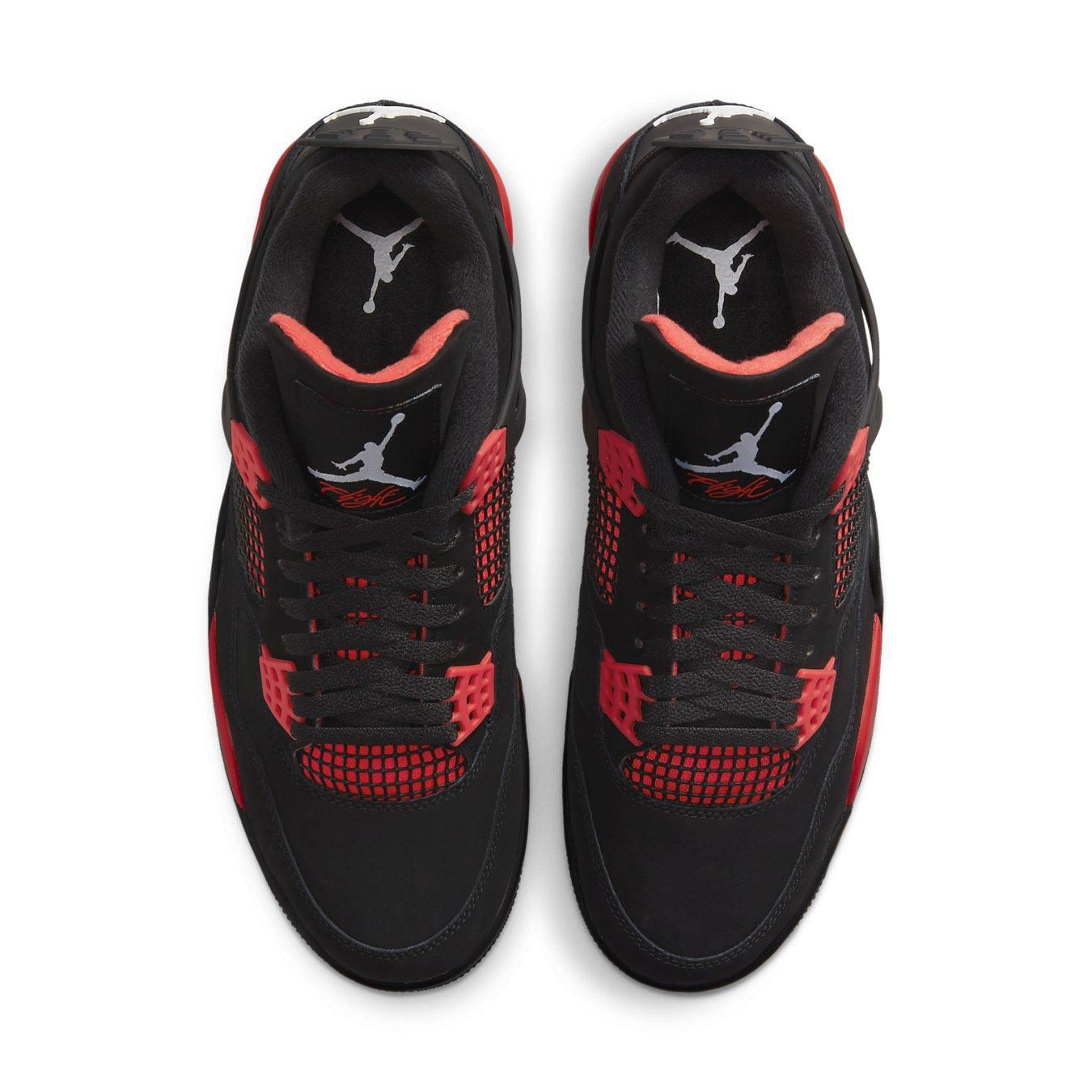 Top view of Air Jordan 4 Retro Red Thunder sneakers featuring black nubuck upper and red accents.