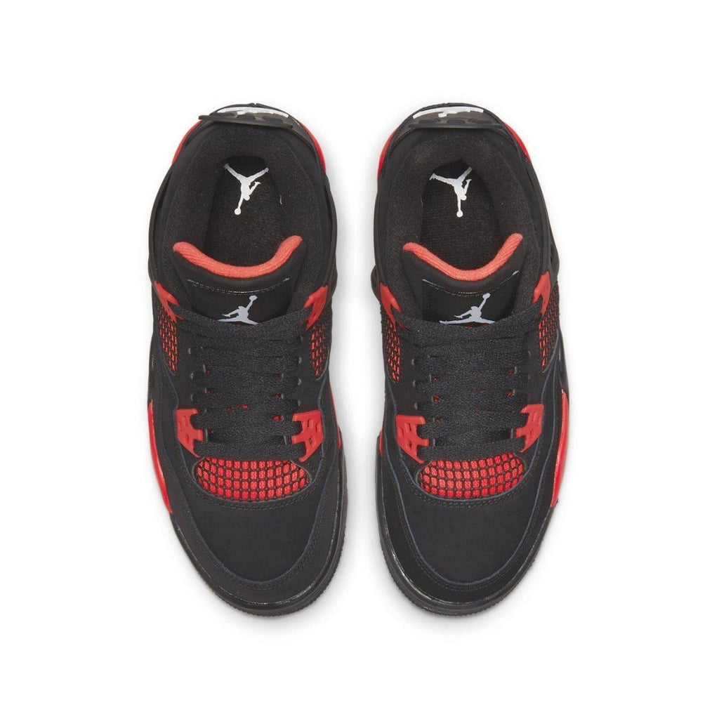 Top view of Air Jordan 4 Retro 'Red Thunder' sneakers featuring black nubuck and red accents.